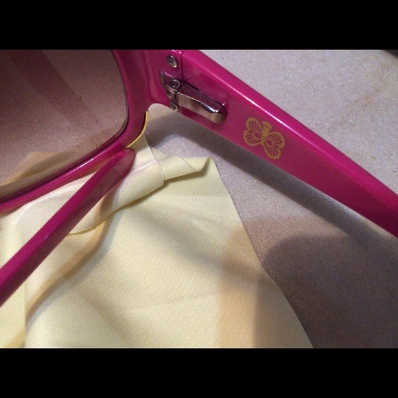 2 pairs of yellow and hot pink sun glasses. - Picture 7 of 9